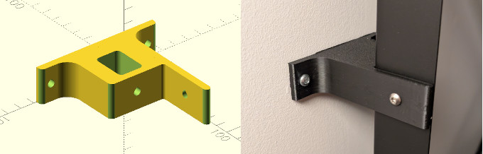 A 3D printed bracket. (The bracket in the photo is upside down relative to the 3D rendering.)